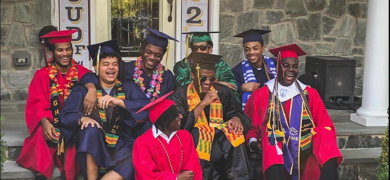 Chris (center) with his River Hill High School graduating class, 2020
